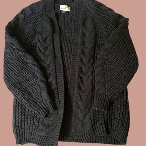 Black knitted sweater with puffy sleeves